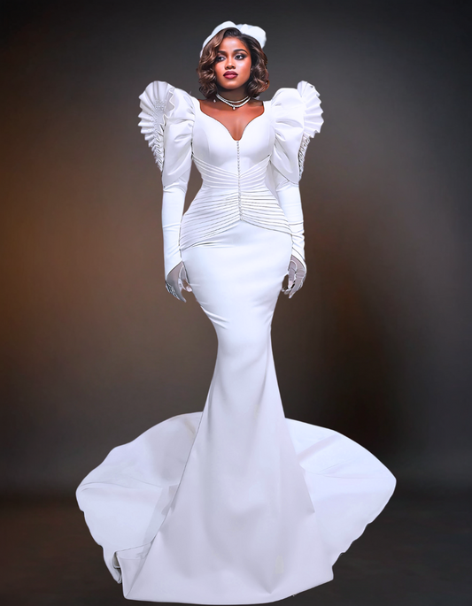 luxurious mermaid wedding dress, featuring elegant puff shoulders. The dress is intricately designed with exquisite details and a flattering silhouette, perfect for a sophisticated and glamorous wedding.