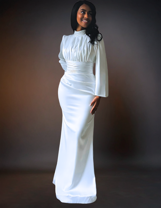 A simple, elegant long sleeve satin wedding dress with a turtle neck