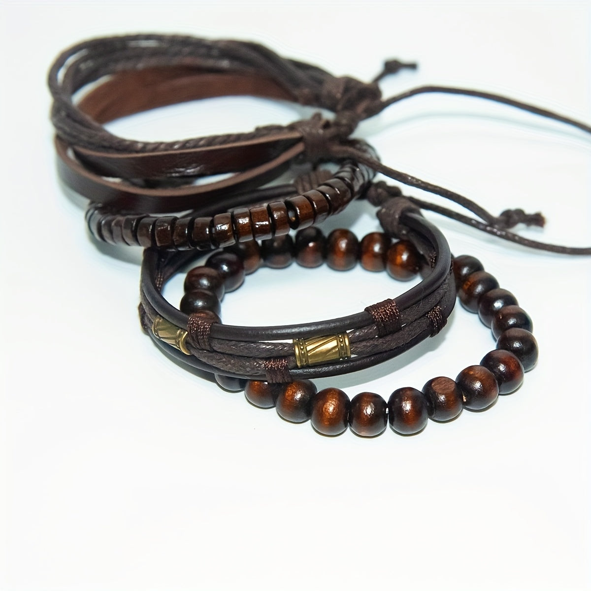 Brown braided leather bracelet set, Stylish wristwear, Trendy fashion accessory, Versatile leather bracelet set.