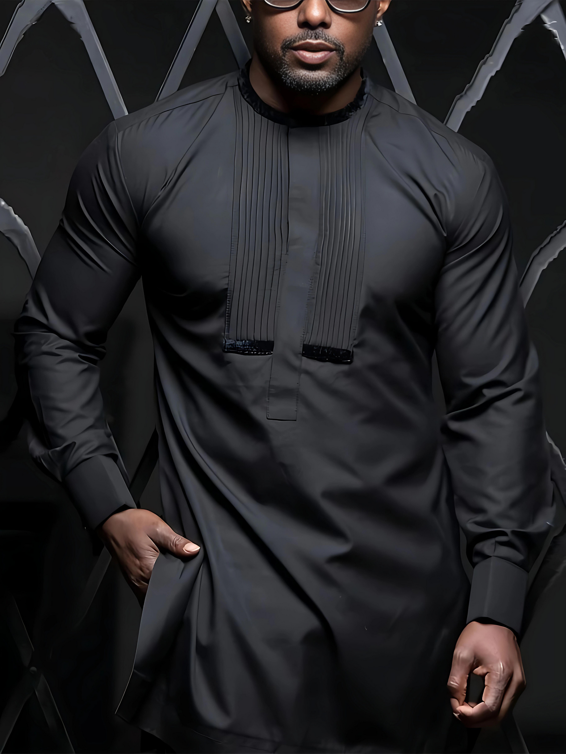 African men's black kaftan outfit set.