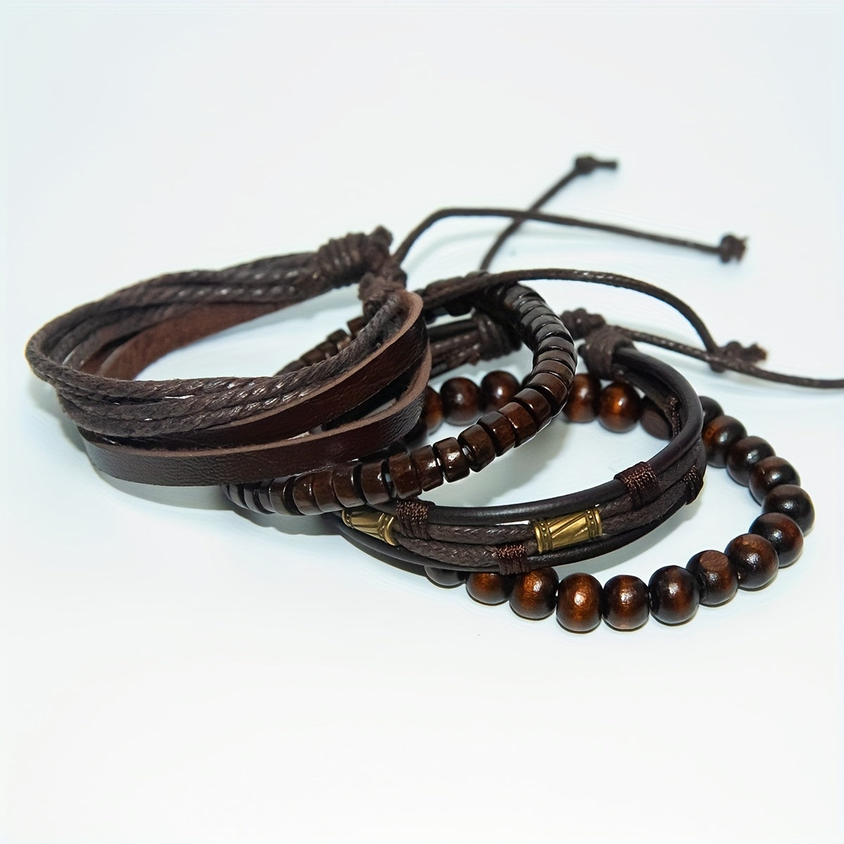 Brown braided leather bracelet set, Stylish wristwear, Trendy fashion accessory, Versatile leather bracelet set.
