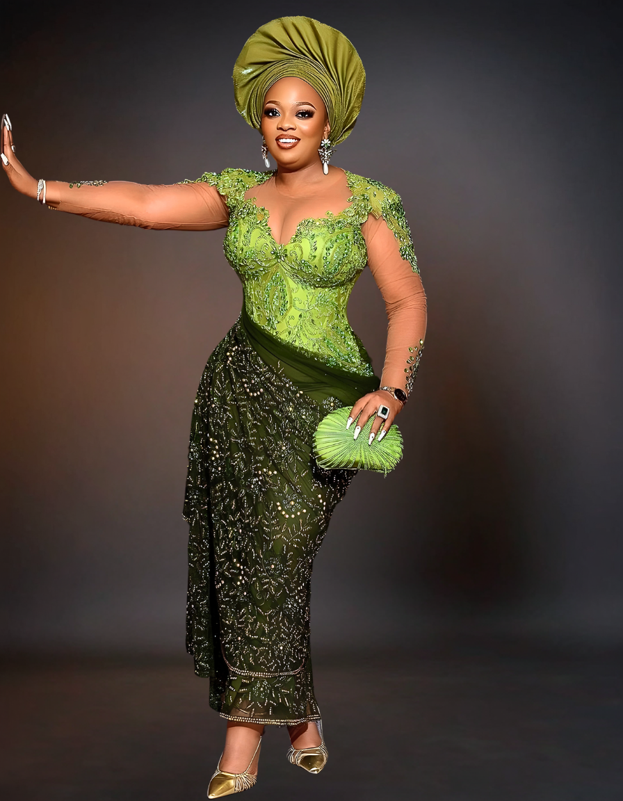luxurious traditional African wedding attire, known as Aso Ebi. The outfit is a rich green color, featuring intricate gold embroidery and embellishments.