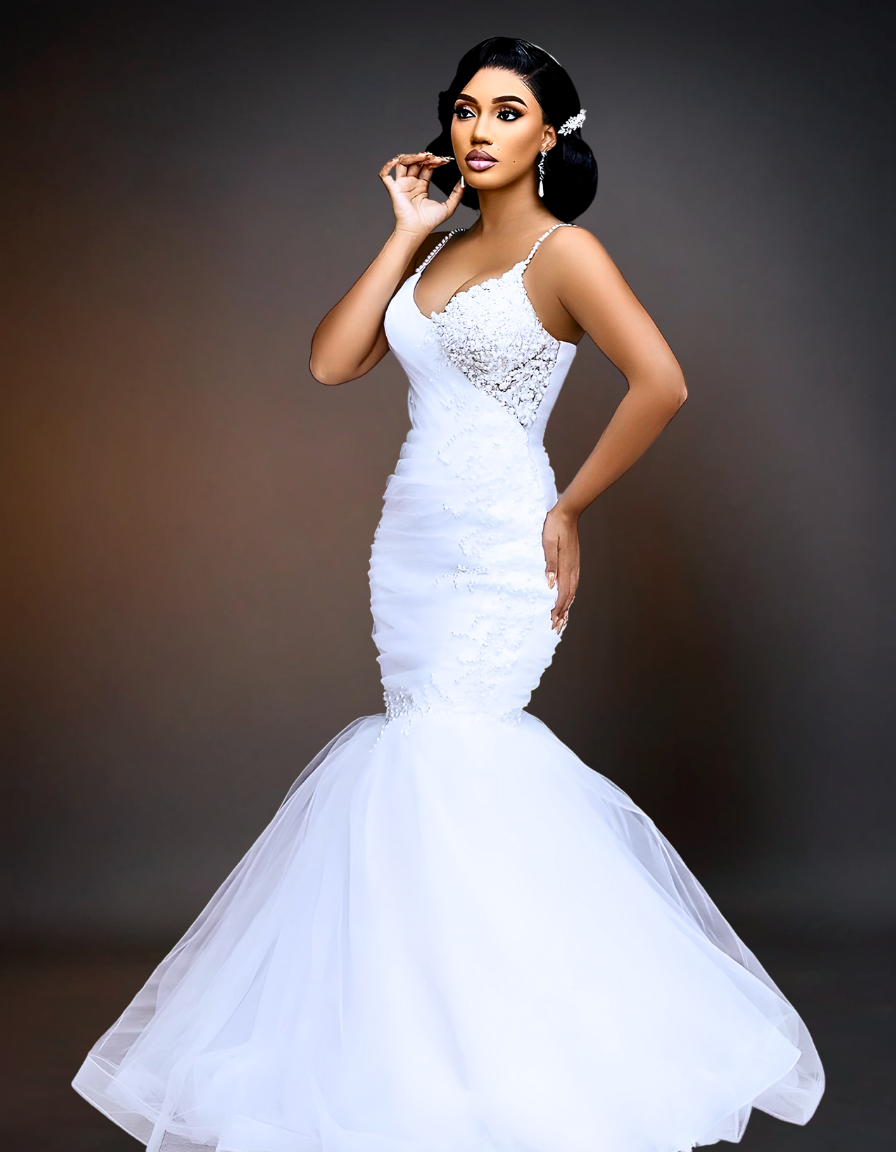 Exquisite lace mermaid wedding gown with intricate detailing and elegant design.