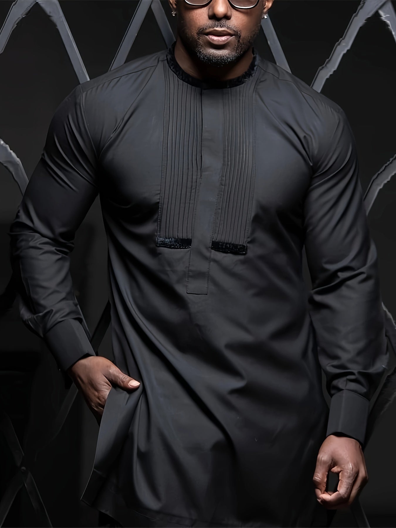 African men's black kaftan outfit set.