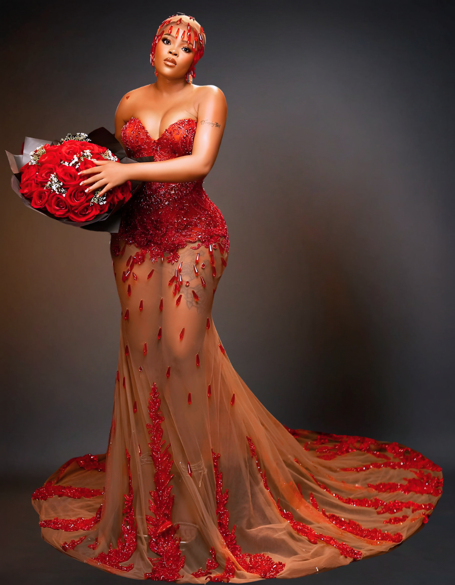 Luxury transparent red prom dress featuring stunning, sheer design with intricate details and a flowing skirt, perfect for making a statement at any formal event.