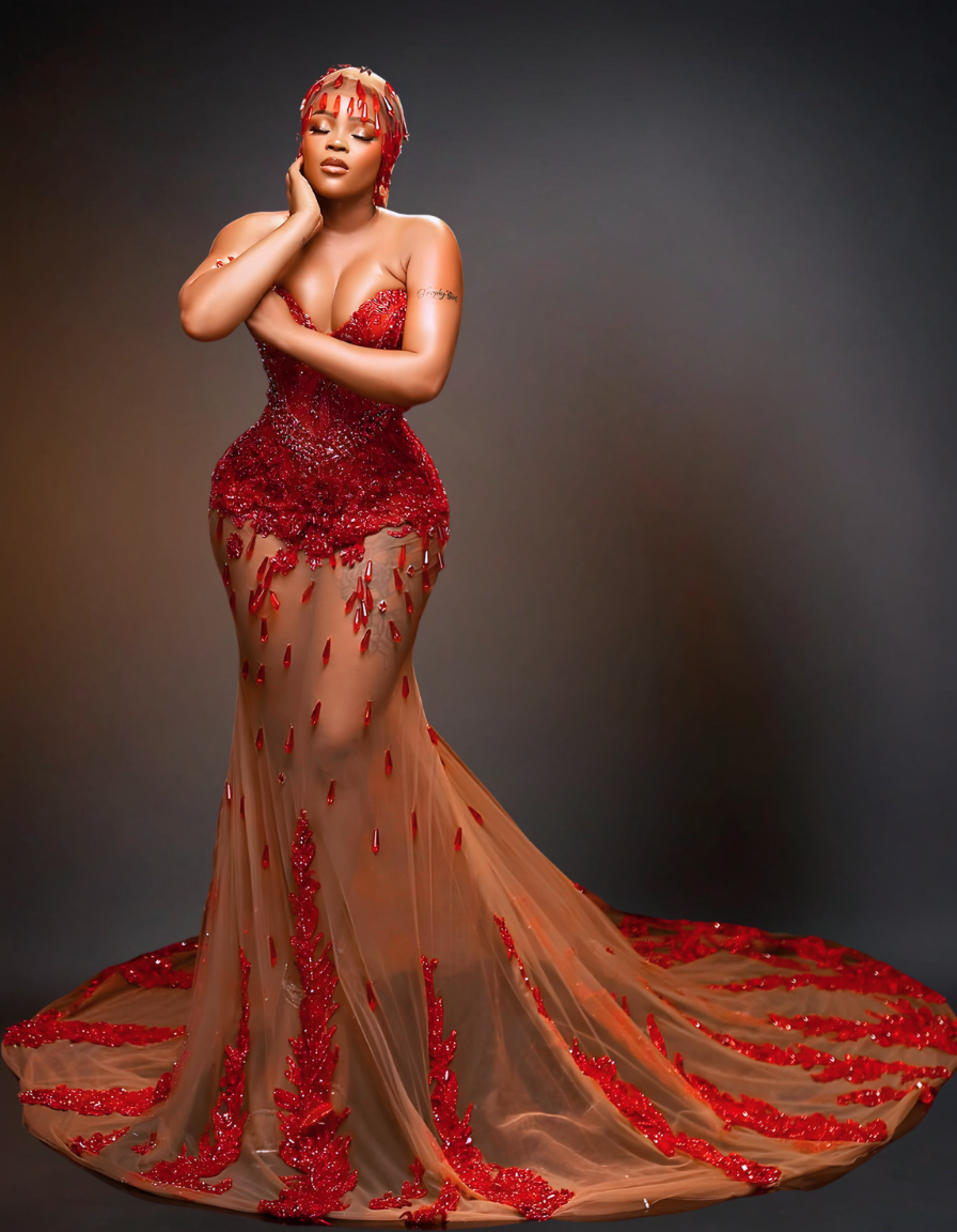 Luxury transparent red prom dress featuring stunning, sheer design with intricate details and a flowing skirt, perfect for making a statement at any formal event.