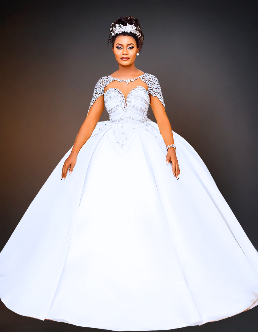  A luxurious mermaid wedding dress featuring a sheer neckline adorned with pearls. The dress includes a detachable skirt, adding versatility and elegance to the design. 