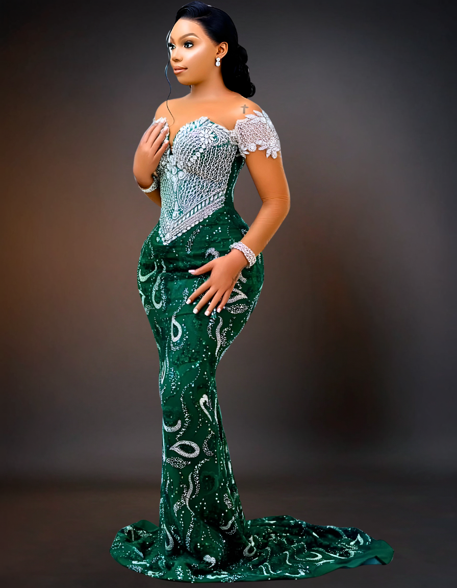 Luxury silver off-shoulder prom dress with emerald embellishments.