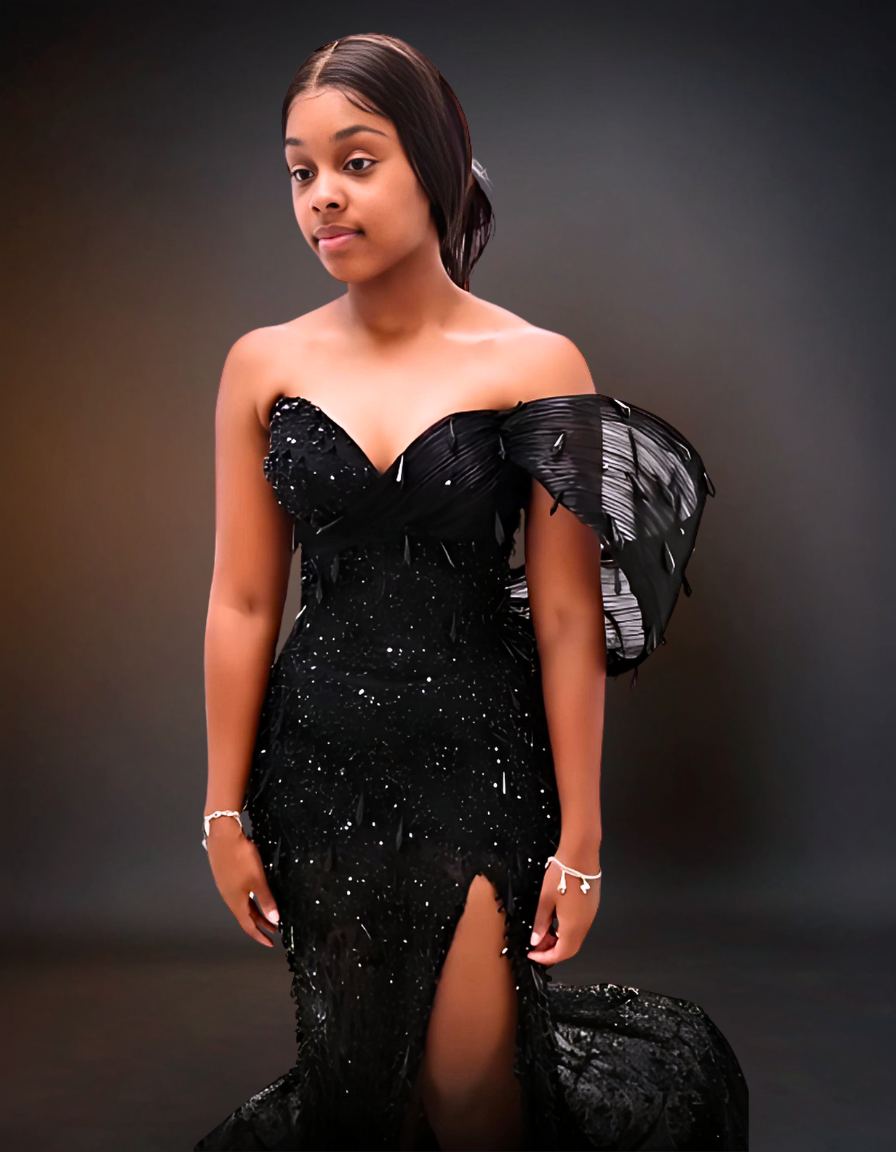 Elegant black lace prom dress adorned with beads, perfect for formal occasions.