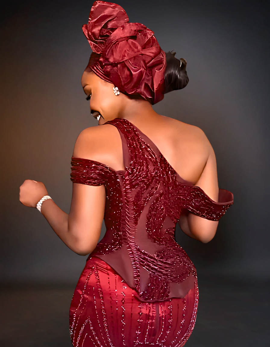 Luxury traditional wedding party dress in burgundy, featuring intricate lace detailing and a flattering silhouette.