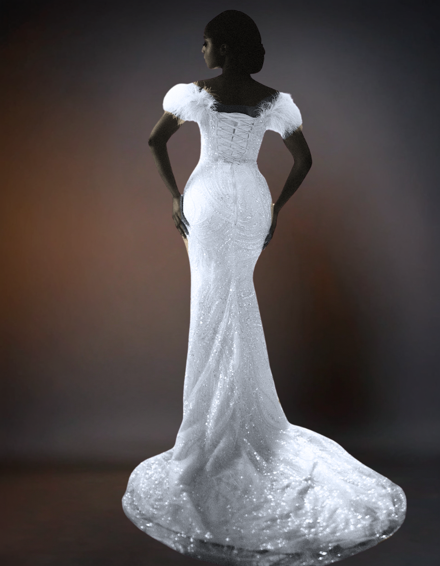 White wedding dress with intricate detailing on a dark background